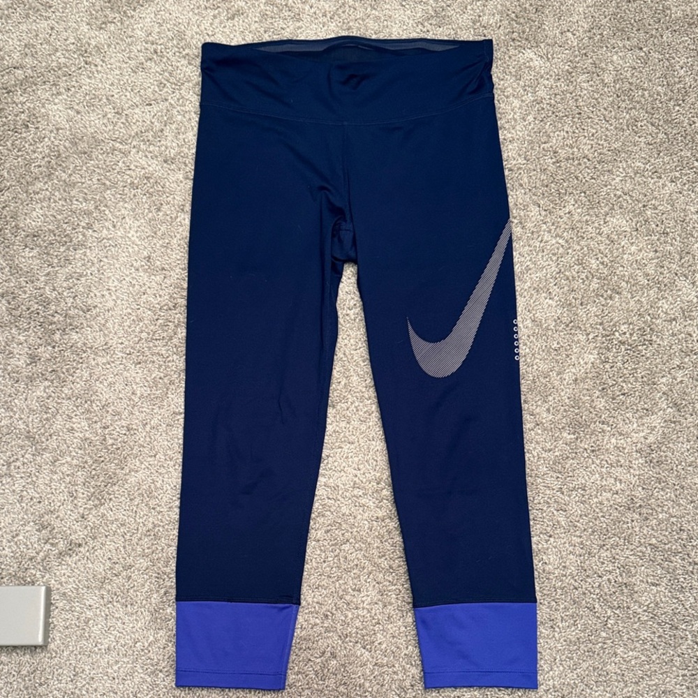 Nike Black and Purple Leggings with Swoosh Logo